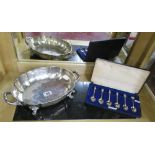 Boxed teaspoons and plated serving bowl