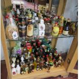 Very large collection of booze miniatures over 2 shelves - Mostly full