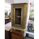 Early gilded corner cabinet