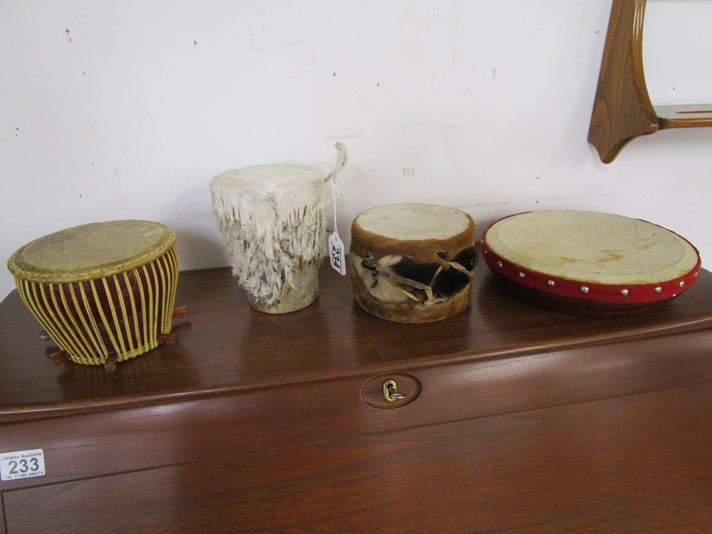 4 small ethnic drums