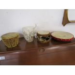 4 small ethnic drums