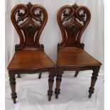 Fine pair of Victorian mahogany hall chairs