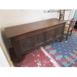 Very large late 17C oak coffer with carved panels