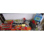 Shelf of OO gauge engines, carriages, track etc