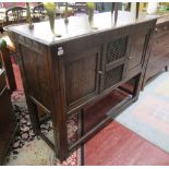 Early oak food cupboard with pierced doors