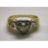 Fine 18ct 3 stone diamond ring - Centre stone approx 1.2ct heart shaped diamond