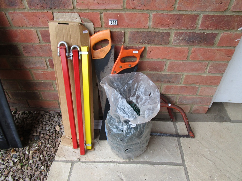 Various tools to include tow bar, fencing, saw etc