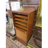 Tambour fronted stationary cabinet