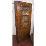 Early walnut corner cabinet