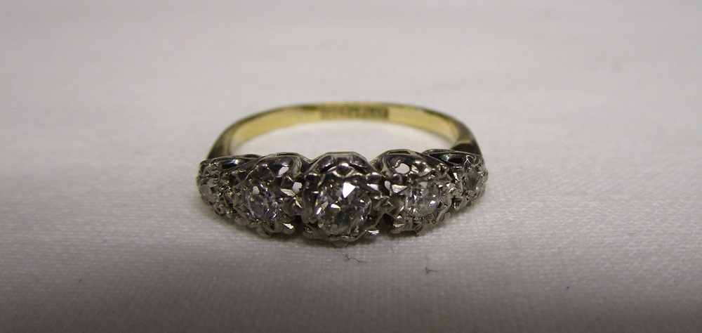 18ct gold 5 stone platinum set diamond ring