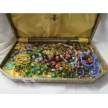 Case of various necklaces (all knotted)
