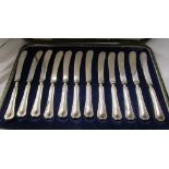 Cased set of 12 silver handled butter knives
