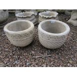 Pair of small stone lattice circular planters