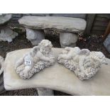 Pair of small stone cherub figures