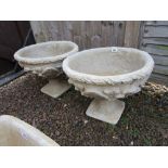 Pair of large stone pedestal planters