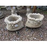 Pair of small stone sack planters