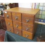 Retro bank of 9 oak drawers