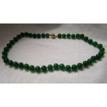 Green stone beads with 9ct clasp