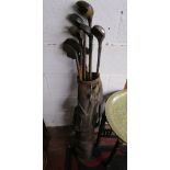 Old hickory shafted golf clubs with bag