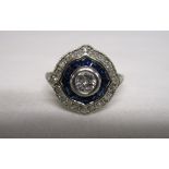 Platinum 1930’s diamond and baguette sapphire cluster ring