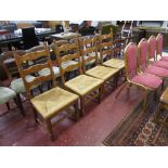 Set of four oak & rush seated dining chairs