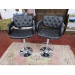 Pair of modern chrome based stools