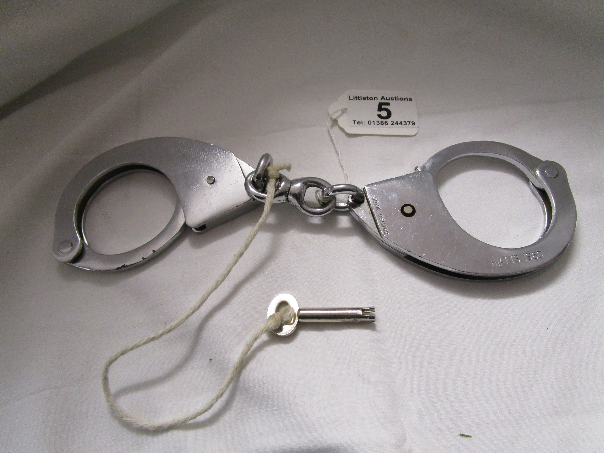 Pair of 1960's Hyatt's police cuffs with key