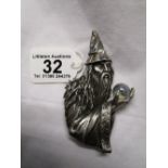 Merlin figure brooch