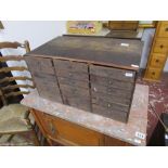 Collectors bank of 18 drawers