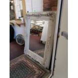 Large ornate framed & bevelled glass mirror