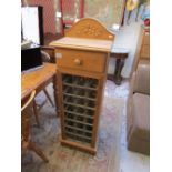 Pine wine cabinet with drawer