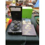 Old Triumph wind-up gramophone and records