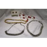 4 assorted necklaces and pair of earrings