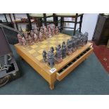 Chess table and soapstone pieces