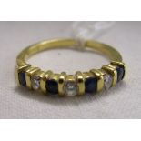 18ct diamond & sapphire half hoop ring