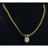 Diamond solitaire pendant in 18ct setting on fine 18ct chain