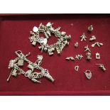 2 silver charm bracelets with spare charms