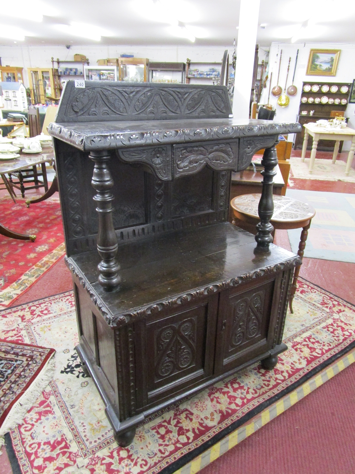 Early carved oak Court cupboard