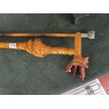 Dragon and lion walking sticks