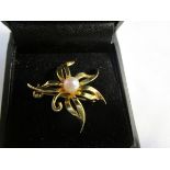 Gold pearl set brooch