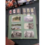 Old postcard album and cigarette card album