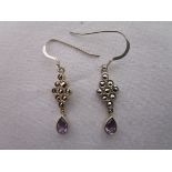 Pair of silver marcasite & amethyst drop set earrings