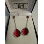 Silver and red stone earrings