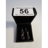 Pair of silver and Caversham amethyst drop earrings