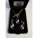 Silver set of Nouveau style earrings and pendant