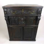 An oak cabinet incorporating 17th and 18th century elements,