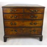 A George III mahogany chest of drawers,