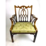 A set of four (2 carvers, 2 single) late 18th century mahogany chairs,