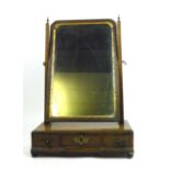 A Georgian mahogany toilet mirror with three drawers to base, h. 55 cm, w. 37 cm, d.