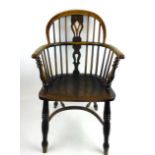 A 19th century ash and elm hoop back Windsor chair,